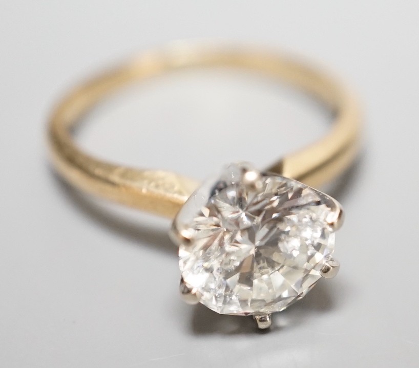 A 14k yellow metal and solitaire diamond ring, the stone weighing 2.04ct, size J/K, gross weight 3.1 grams